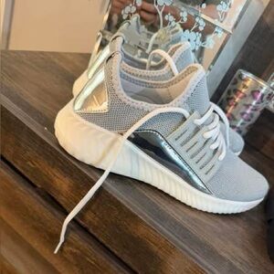 Gray and silver boutique shoes. Brand New never worn!